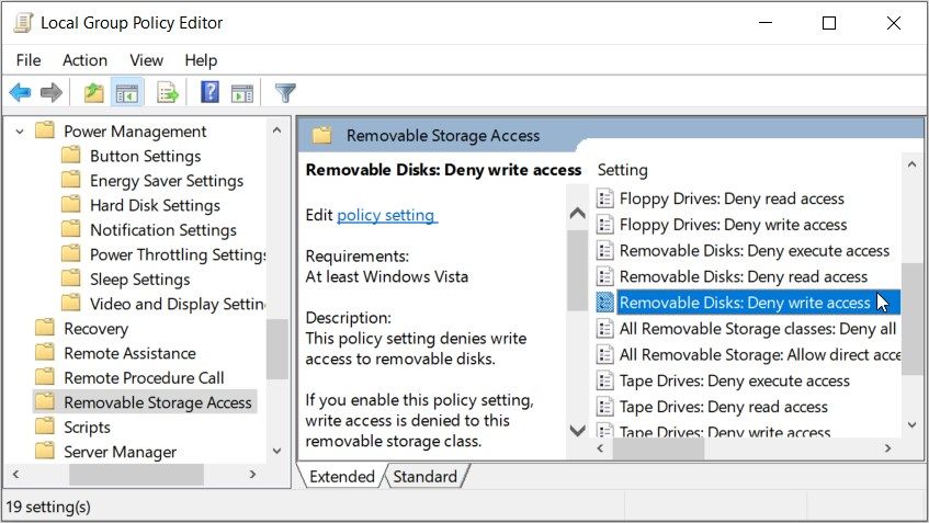 Mengklik opsi “Disk yang Dapat Dilepas Tolak Akses tulis” di LGPE