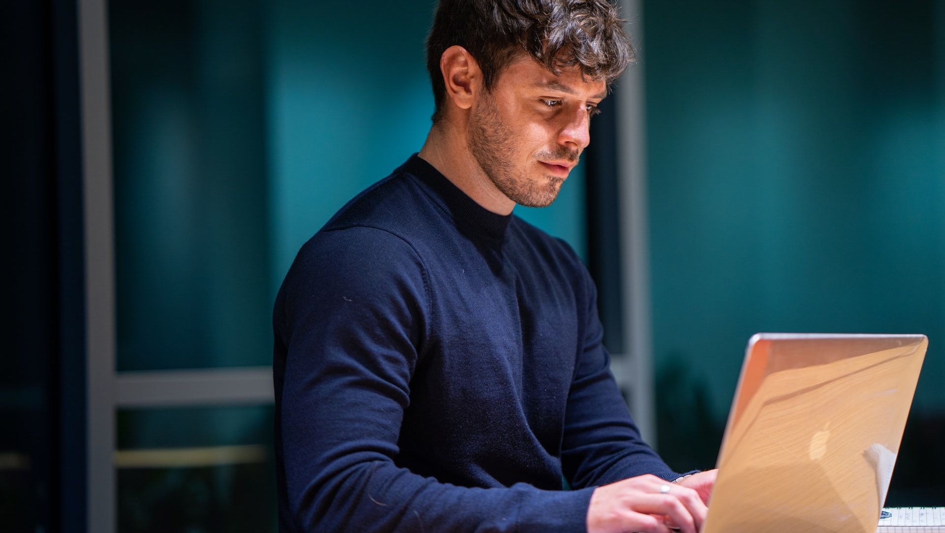 Man Typing on Computer