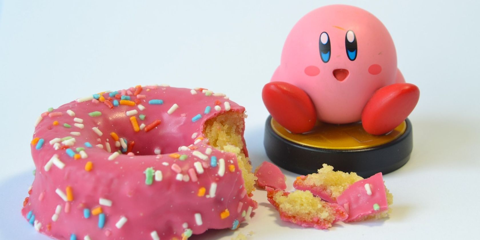 Kirby-Amiibo-Beside-Pink-Donut-1